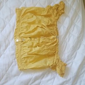A cute yellow off the shoulder crop top